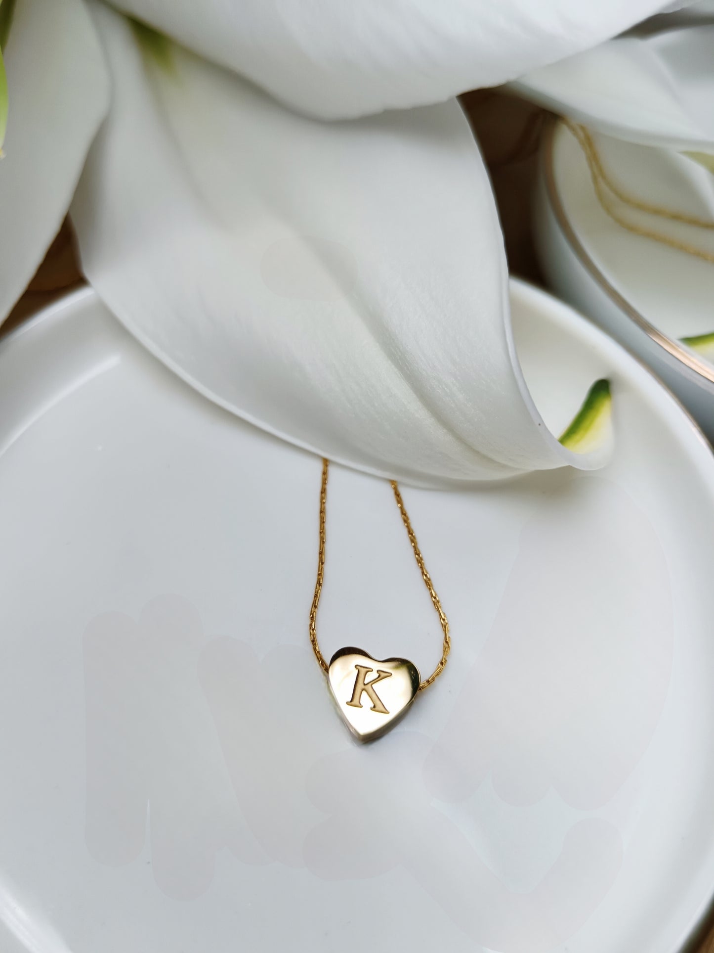 Collier initiale K en acier inoxydable doré