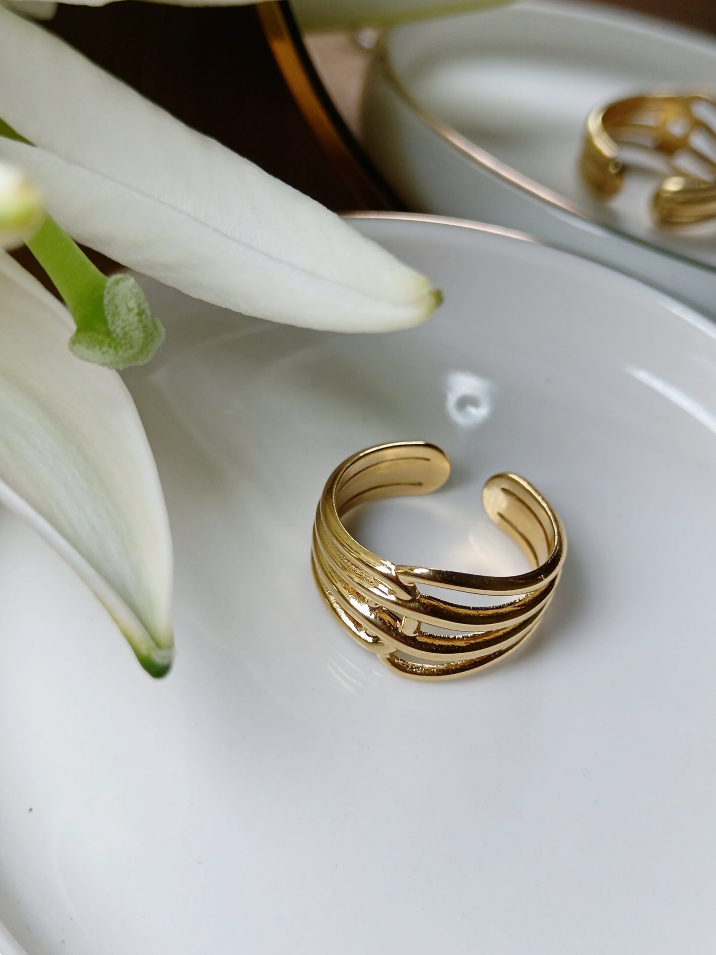 Bague lignes croisées en acier inoxydable doré réglable