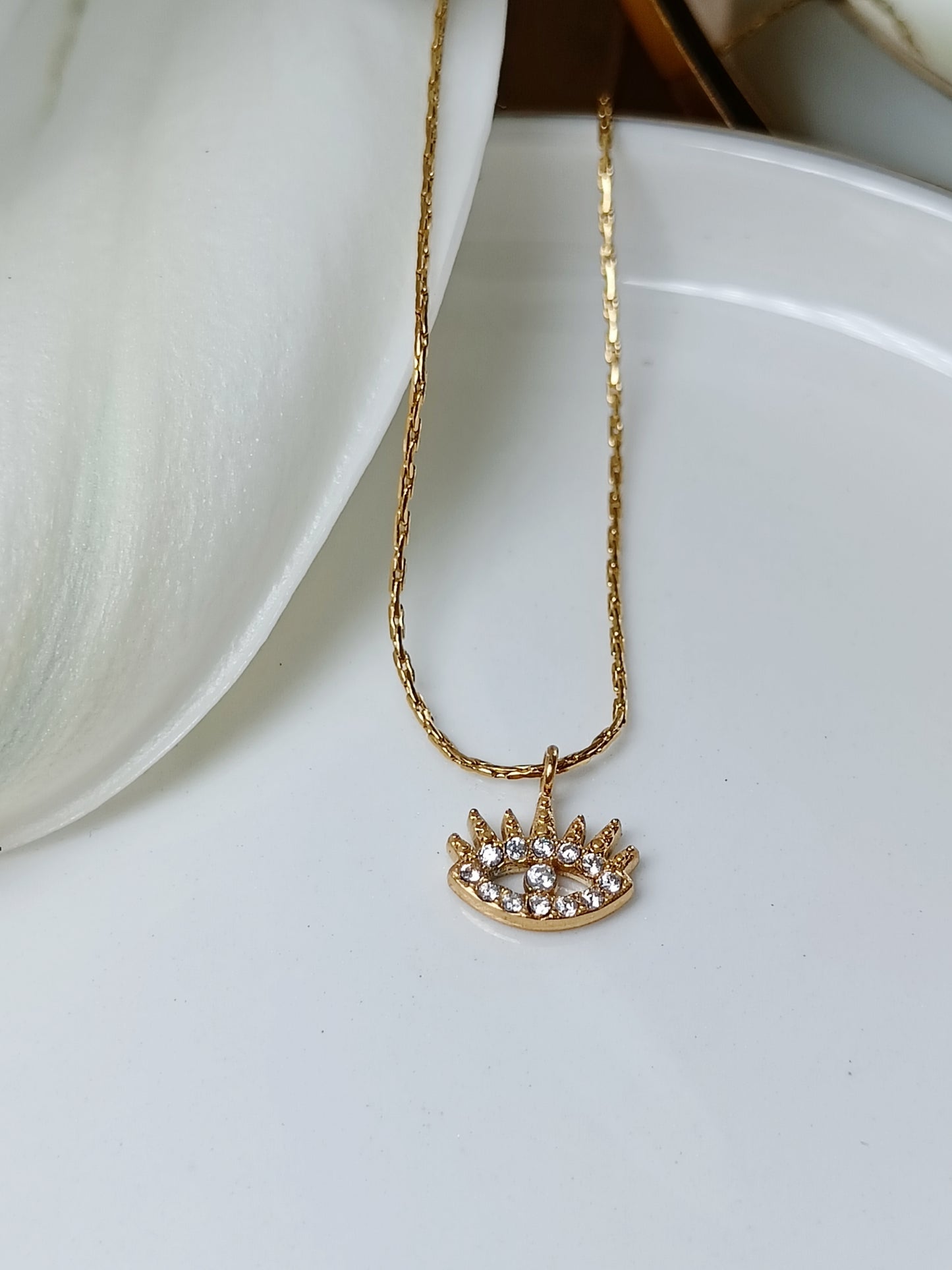 Collier œil strass en acier inoxydable doré