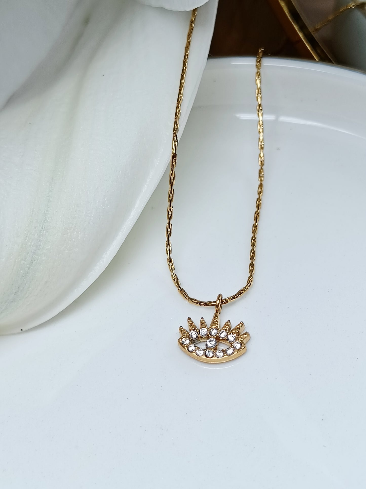 Collier œil strass en acier inoxydable doré