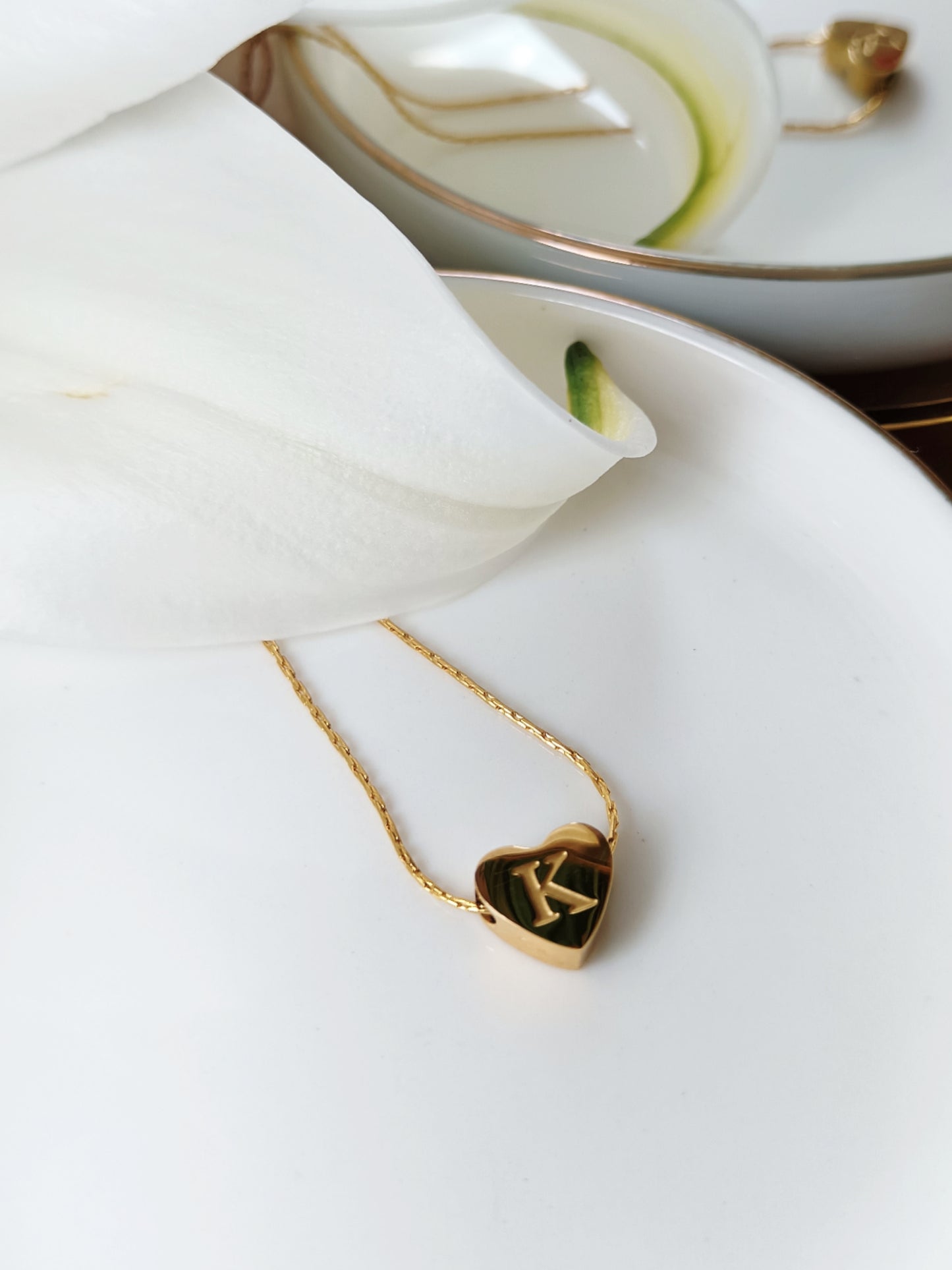 Collier initiale K en acier inoxydable doré