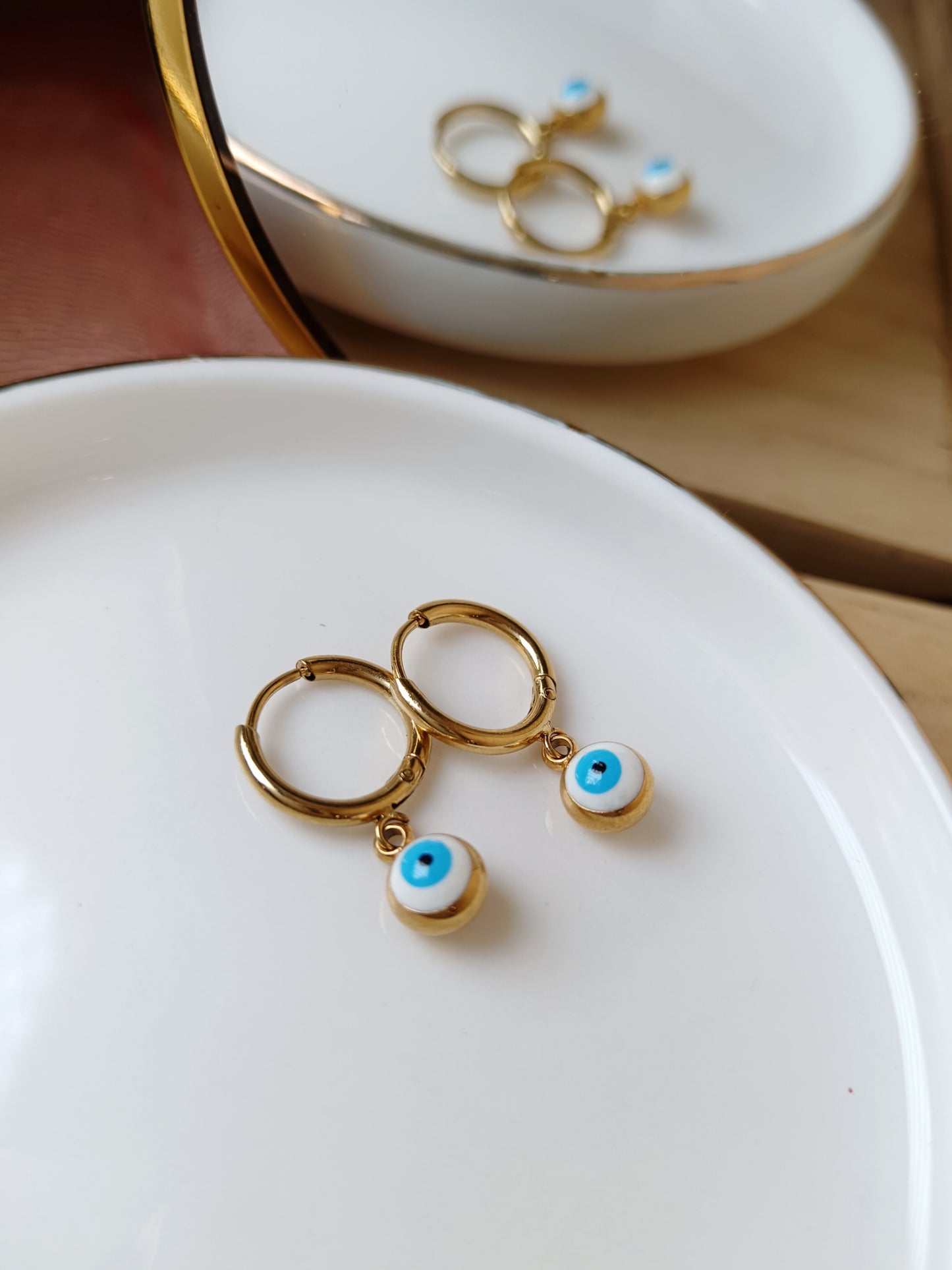 Boucles œil rond bleu clair