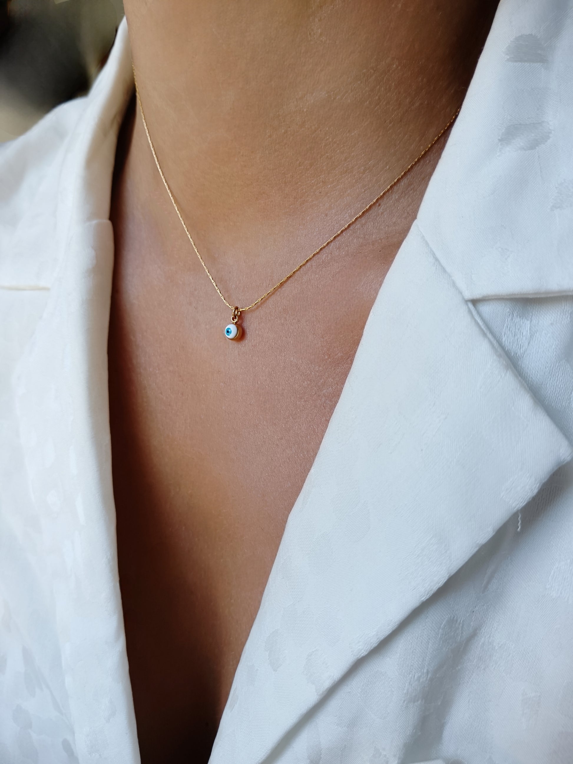 Collier œil en acier inoxydable doré